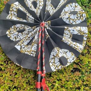 African Ankara Print Folding Fan . Made With Leather Handles .